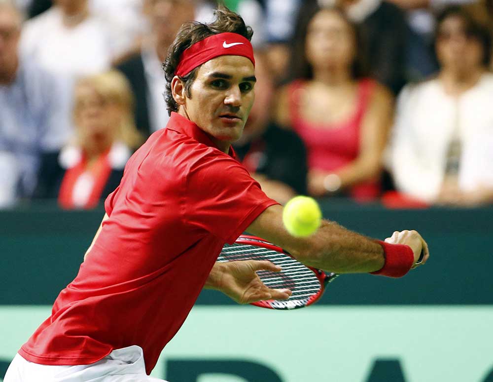 Federer resiste lo saques de Groth y pasa a octavos de final