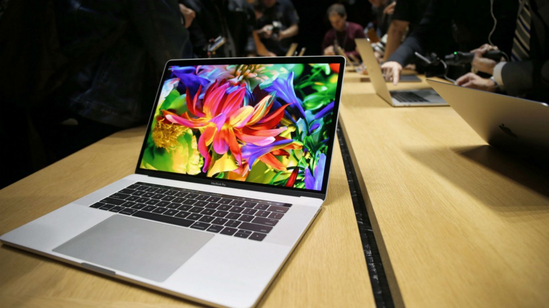 Nuevo MacBook Pro de Apple tendrá lector de huellas y barra táctil en teclado
