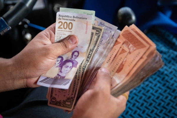 “Empresas han ajustado pagos a la base del dólar oficial”