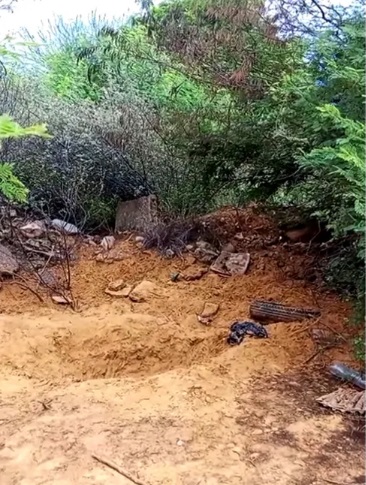 Hallan a hombre enterrado en terreno baldío