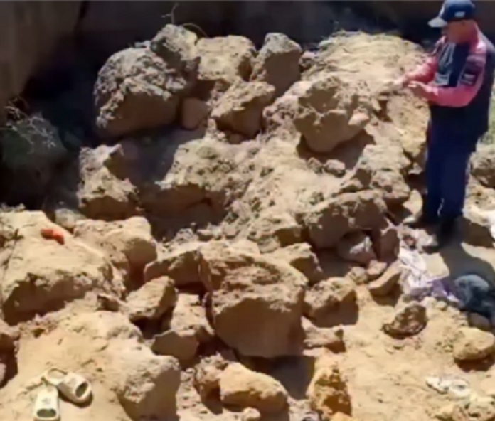 Muere joven tapido en saque de arena