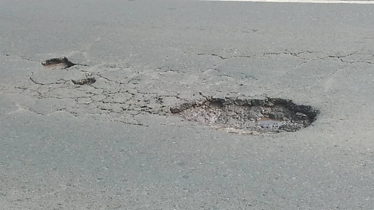 Alertan de cráteres en el km 26 de la Panamericana