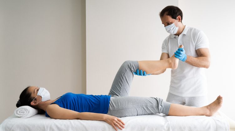 Physiotherapy Knee Injury Rehab And Massage With Face Mask