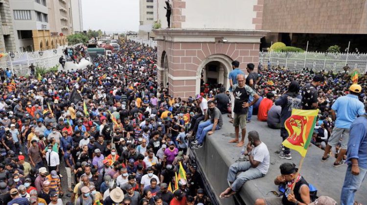 Demonstrators protest inside the President's House premises, after President Gotabaya Rajapaksa fled, amid the country's economic crisis, in Colombo, Sri Lanka July 9, 2022. REUTERS/Dinuka Liyanawatte