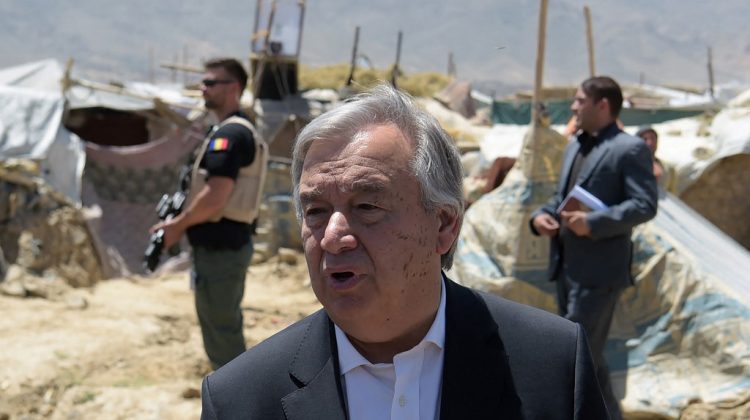 (FILES) In this file photo taken on June 14, 2017, UN Secretary-General Antonio Guterres speaks with the media at a camp for internally displaced persons on the outskirts of Kabul. - "Horrifying" reports have emerged that the Taliban have imposed severe restrictions on the rights of women and girls in the areas the militants have seized, Guterres said on August 13, 2021. (Photo by SHAH MARAI / AFP)