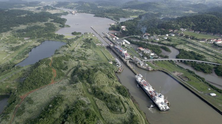 Ships with containers sail on Miraflores Locks in this Friday, Oct. 2
