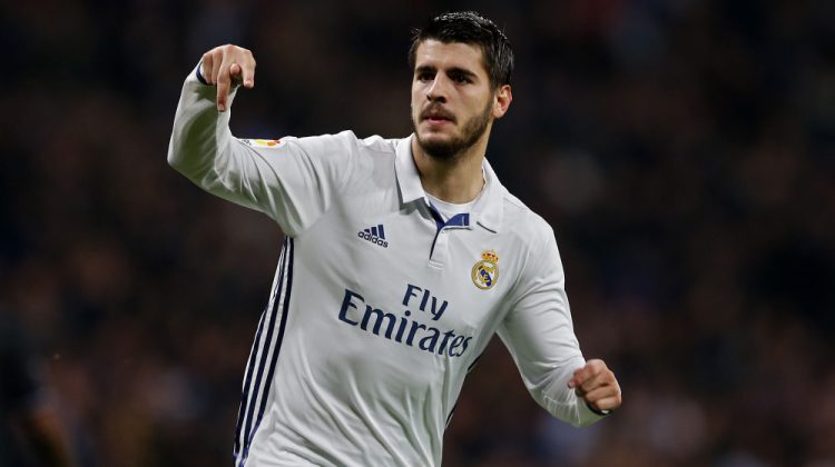 Real Madrid's Alvaro Morata celebrates after scoring the opening goal against Deportivo during a Spanish La Liga soccer match between Real Madrid and Deportivo Coruna at the Santiago Bernabeu stadium in Madrid, Saturday, Dec. 10, 2016.