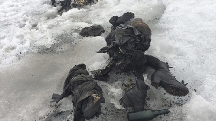 In this photo released by the Swiss train company ' Glacier 3000'  shoes and clothing are visible at a Swiss glacier where two bodies were found. . Police say the bodies of what appear to be two people killed in an accident decades ago have been recovered from a glacier in southwestern Switzerland. Valais canton police say the bodies were found on the Tsanfleuron glacier Friday  July 14, 2017 at an altitude of 2,615 meters (8,580 feet). They say the equipment found suggests that they died decades ago, and that formal identification with the help of DNA will take several days. (GLACIER 3000/Keystone via AP)