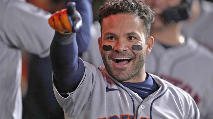 Houston Astros' Jose Altuve points to fans after hitting a grand slam against the San Francisco Giants during the sixth inning of a baseball game Friday, July 30, 2021, in San Francisco. (AP Photo/Tony Avelar)