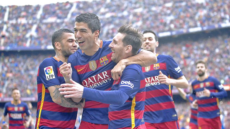 FC Barcelona's Lionel Messi, third right, celebrates after scoring with his teammate Luis Suarez, second left, during a Spanish La Liga soccer match between FC Barcelona and Espanyol at the Camp Nou stadium in Barcelona, Spain, Sunday, May 8, 2016. (AP Photo/Manu Fernandez)