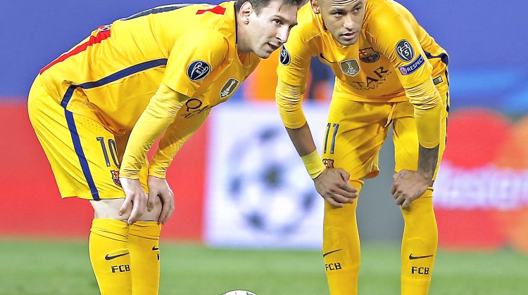 Barcelona's Lionel Messi, left, and Neymar, right, look on during the Champions League 2nd leg quarterfinal soccer match between Atletico Madrid and Barcelona at the Vicente Calderon stadium in Madrid, Spain, Wednesday April 13, 2016. Atletico defeated Barcelona by 2-0. (AP Photo/Paul White)