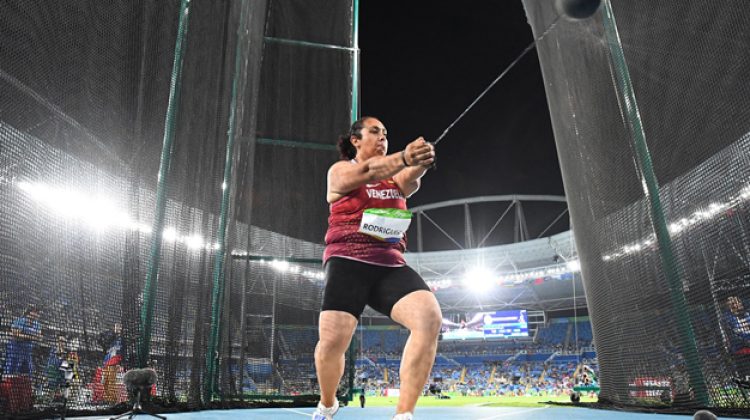 Venezuela's Rosa Rodriguez competes in the Women's Hammer Throw Qualifying Round during the athletics event at the Rio 2016 Olympic Games at the Olympic Stadium in Rio de Janeiro on August 12, 2016.   / AFP PHOTO / FRANCK FIFE