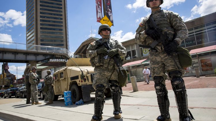 National Guard troops stand watch along E. Pratt St. in Baltimore, Maryland