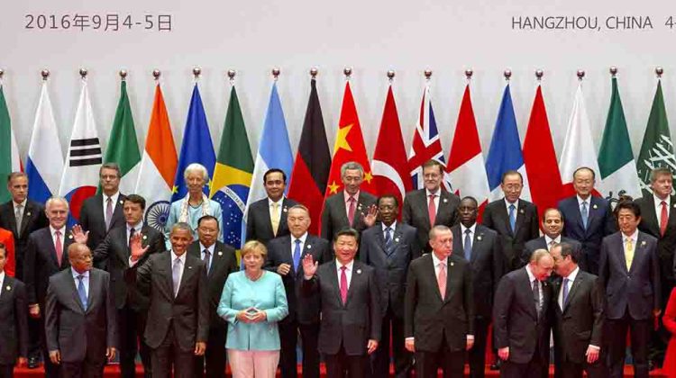 State leaders take part in a group photo session for the G20 Summit held at the Hangzhou International Expo Center in Hangzhou in eastern China's Zhejiang province, Sunday, Sept. 4, 2016. (AP Photo/Ng Han Guan) APTOPIX China G20