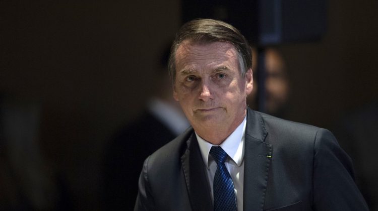 Brazilian President Jair Bolsonaro attends a meeting with evangelical leaders at the Hilton Barra Hotel, in Barra da Tijuca neighborhood, Rio de Janeiro, Brazil on April 11, 2019. (Photo by Mauro Pimentel / AFP)