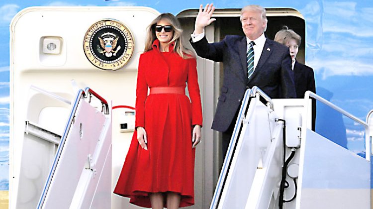 WEST PALM BEACH, FL - MARCH 17:  President Donald Trump, his wife Melania Trump and their son Barron Trump arrive together on Air Force One at the Palm Beach International Airport to spend part of the weekend at Mar-a-Lago resort on March 17, 2017 in West Palm Beach, Florida. President Trump has made numerous trips to his Florida home since the inauguration.  (Photo by Joe Raedle/Getty Images)
