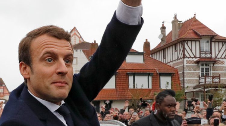 French presidential election candidate Emmanuel Macron, head of the political movement En Marche !, or Onwards ! gives thumb up to supporters as he leaves a polling station after voting in the the second round of 2017 French presidential election, in Le Touquet, France, May 7, 2017. REUTERS/Philippe Wojazer      TPX IMAGES OF THE DAY