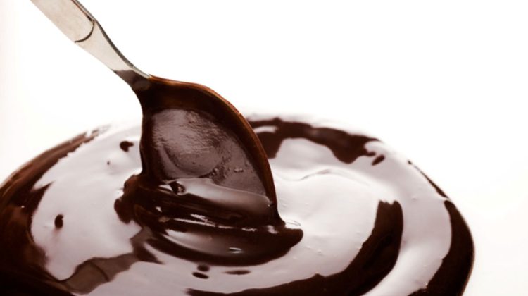 Spoon in a pool of chocolate