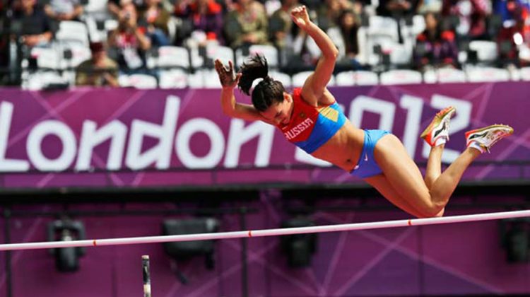 FILE - In this Aug. 4, 2012 file picture Russia's Yelena Isinbayeva competes in a women's pole vault qualification round during the athletics in the Olympic Stadium at the 2012 Summer Olympics, London.  The Court of Arbitration for Sport  was scheduled to issue a verdict Thursday  July 21, 2016 in the case of 68 Russian track and field athletes seeking to overturn the ban imposed by the IAAF following allegations of state-sponsored doping and cover-ups. Russia lost the appeal against an Olympic ban on its track and field athletes Thursday   (AP Photo/David J. Phillip,file) OLY Russia Doping