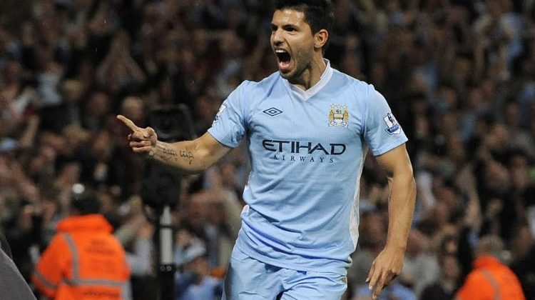 Manchester City's  Sergio Aguero celebrates after scoring during their English Premier League soccer match against Swansea City at the Etihad stadium in Manchester, northern England  August 15, 2011. REUTERS/Nigel Roddis  (BRITAIN - Tags: SPORT SOCCER) EDITORIAL USE ONLY. No use with unauthorized audio, video, data, fixture lists, club/league logos or "live" services. Online in-match use limited to 45 images, no video emulation. No use in betting, games or single club/league/player publications